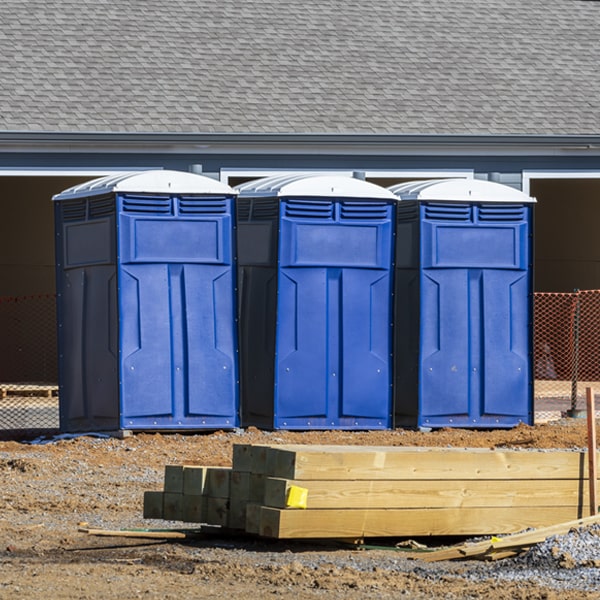 what is the cost difference between standard and deluxe portable toilet rentals in Wiota